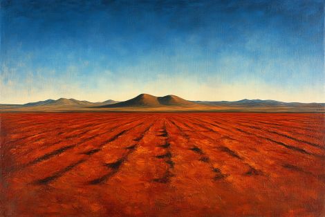 Crimson Plains Beneath Distant Mountains